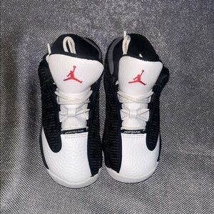 Jordan Black and White Sneakers with Red Logo